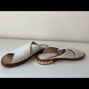 White Stuart Weitzman Slip-on sandals